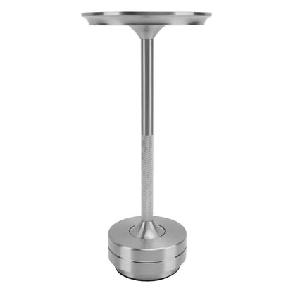 Lampa de masa LED elegantă pe o masă, cu design modern și lumina caldă, ideală pentru citit și relaxare.