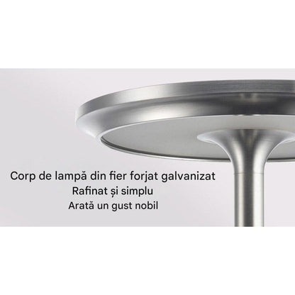 Lampa de masa cu corp din fier forjat galvanizat, elegantă și modernă, potrivită pentru orice decor.